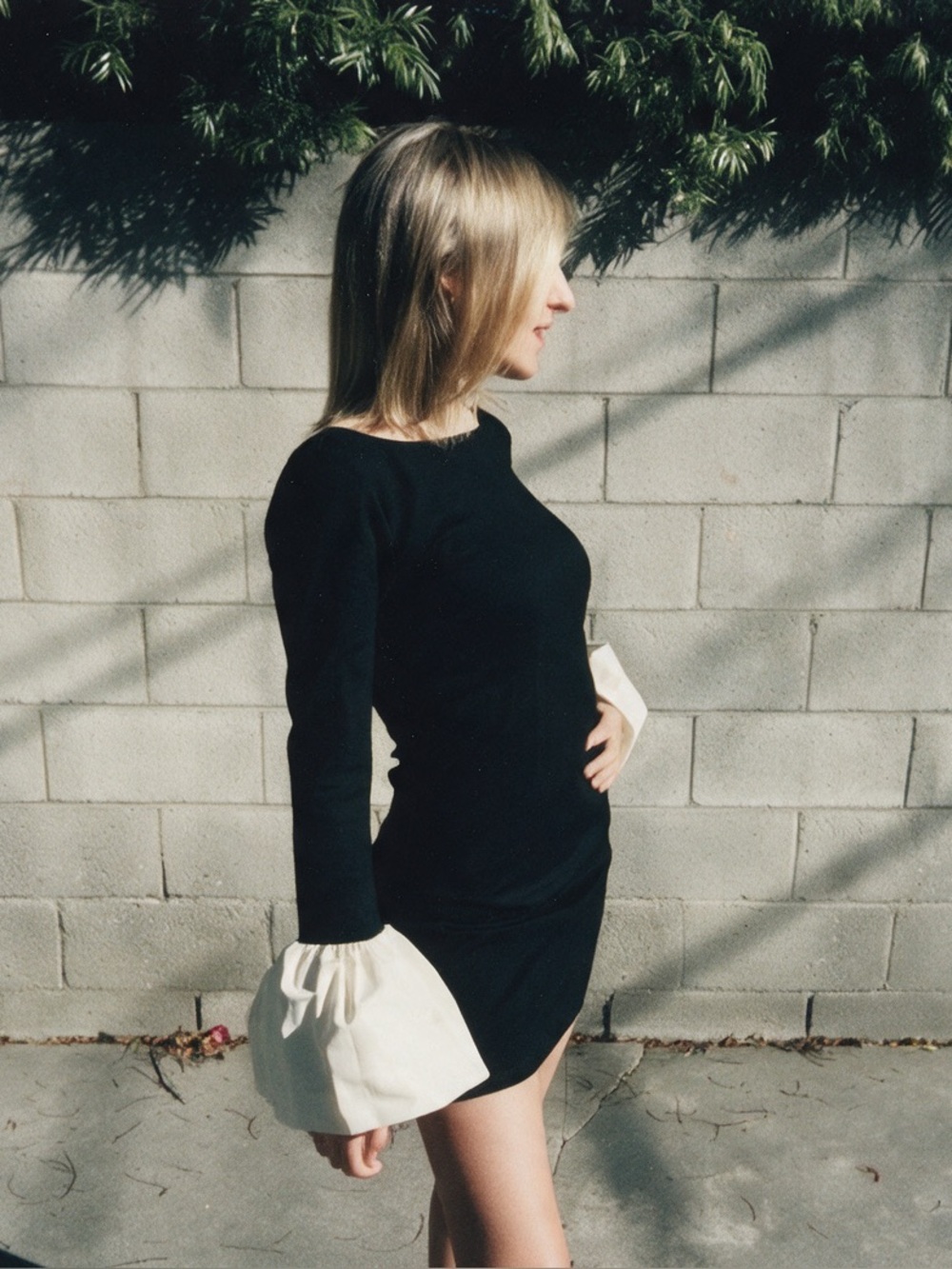 STAUD Black Mini Dress with White Statement Balloon Cuffs
